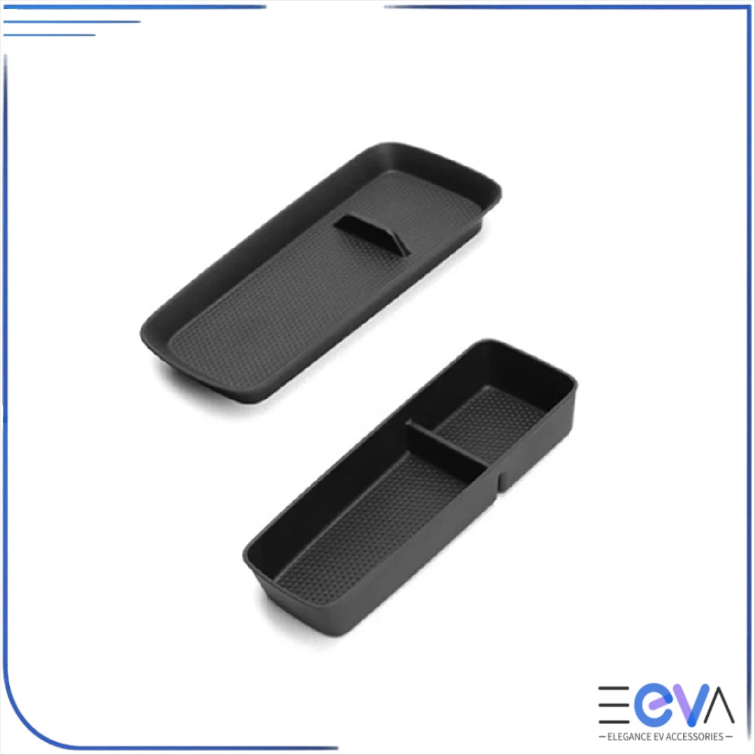 BYD Atto 1 rear console storage box and upper tray shown separately, displaying modular design and textured surfaces from EEVA Store Australia.