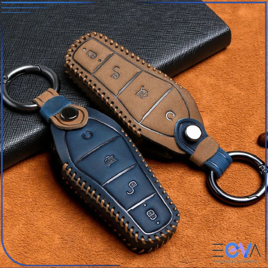 BYD vehicles genuine leather key cover case in blue and brown with stitched edges and metal keyrings shown together from EEVA Store Australia.