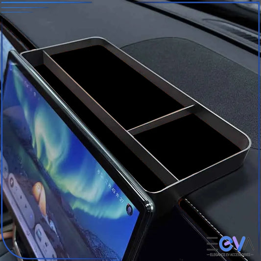 BYD Sealion 7 rear screen storage tray close-up view showing divided sections designed to keep the dashboard area organised from EEVA Store Australia.