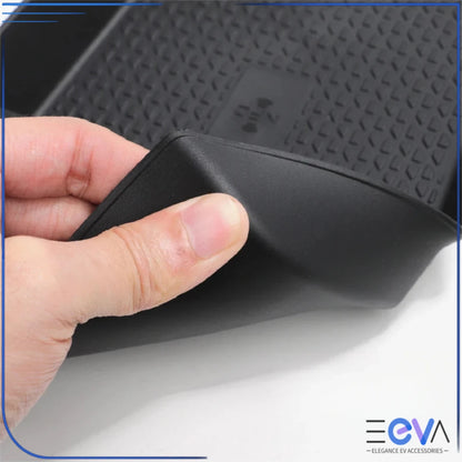 BYD Atto 2 lower storage box showing flexible rubber edges and textured padding for secure item placement from EEVA Store Australia.