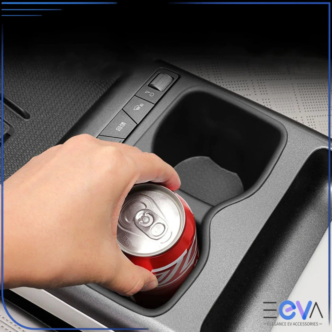 BYD Atto 2 cup holder insert demonstrating secure fit while holding a drink can in the centre console area from EEVA Store Australia.