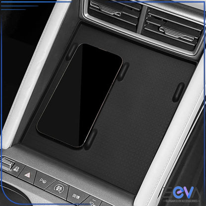 BYD Atto 2 charging pad insert holding a smartphone securely on the centre console with anti-slip grip from EEVA Store Australia.