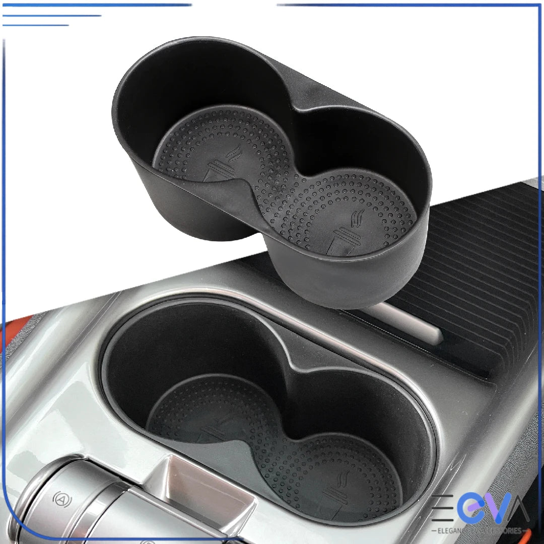 BYD Dolphin central armrest cup holder insert shown fitted inside the console, designed to securely hold two cups while driving from EEVA Store Australia.