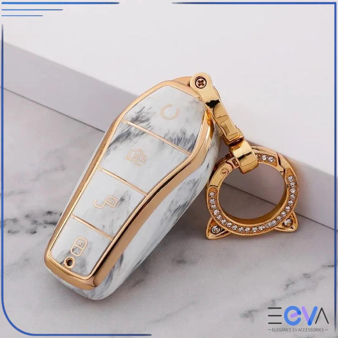 BYD car key case in marble white with cat ear buckle keychain, highlighting decorative and protective design from EEVA Store Australia.