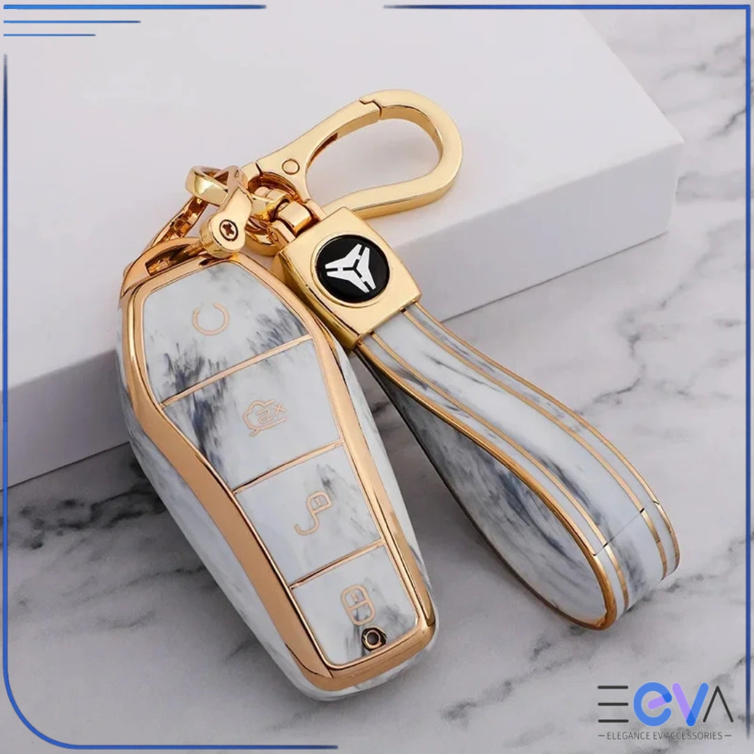 BYD car key case in marble white with strap keychain attached, showing secure protective fit and finish from EEVA Store Australia.
