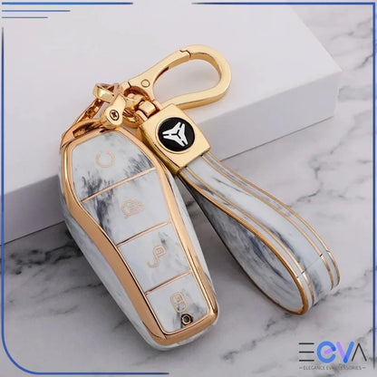 BYD car key case in marble white with strap keychain attached, showing secure protective fit and finish from EEVA Store Australia.