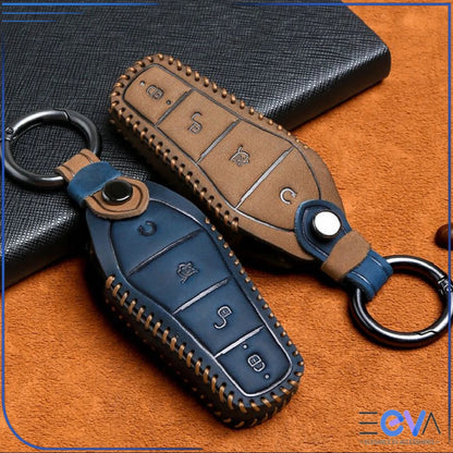 BYD vehicles genuine leather key cover case in blue and brown with stitched edges and metal keyrings shown together from EEVA Store Australia.