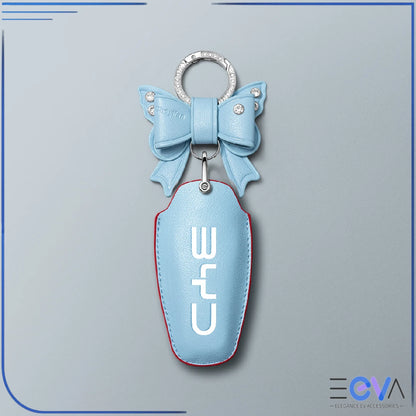 BYD blue microfibre leather key cover with bow keychain from EEVA Store Australia