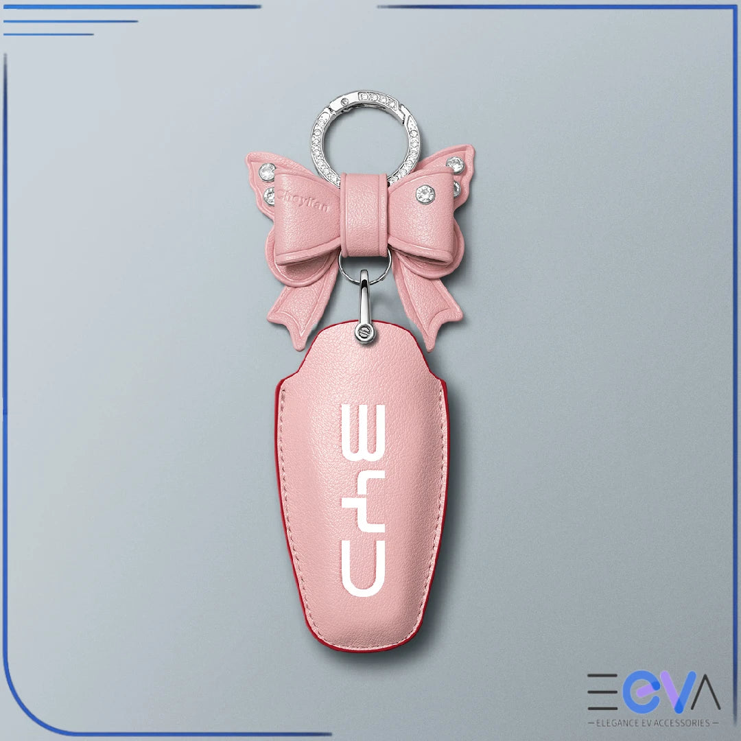 BYD pink microfibre leather key cover with bow keychain from EEVA Store Australia