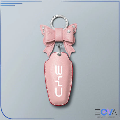 BYD pink microfibre leather key cover with bow keychain from EEVA Store Australia