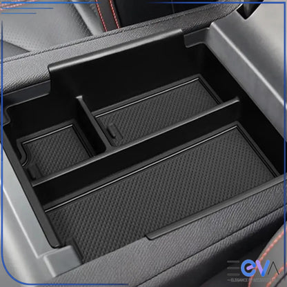 BYD Shark 6 armrest storage box close-up highlighting textured anti-slip surface and raised dividers from EEVA Store Australia.