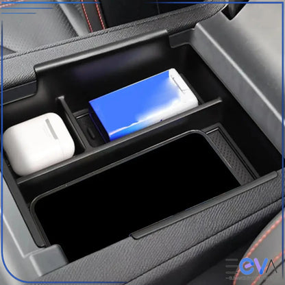 BYD Shark 6 armrest storage box fitted inside console, showing perfect fit and divided layout for accessories from EEVA Store Australia.