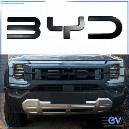 BYD Shark 6 front emblem cover installed on grille showing blacked-out 3D badge finish from EEVA Store Australia.