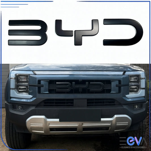 BYD Shark 6 front emblem cover installed on grille showing blacked-out 3D badge finish from EEVA Store Australia.