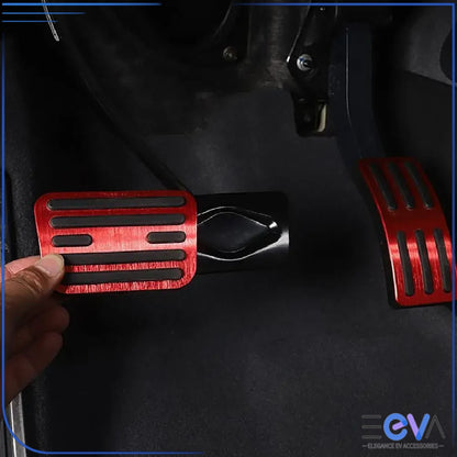 BYD Shark 6 aluminium pedal covers being installed, showing fitment process on the accelerator and brake pedals from EEVA Store Australia.