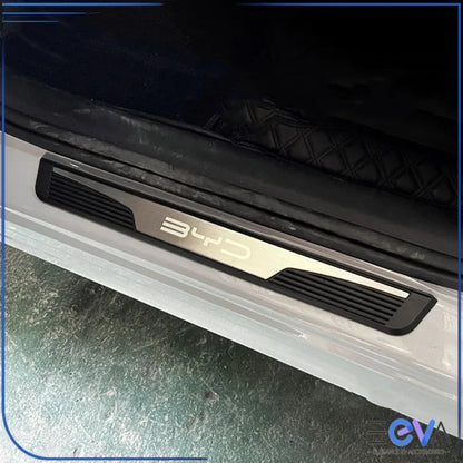 BYD silver stainless steel door sill plate installed on vehicle entry step for scratch protection and premium look from EEVA Store Australia.